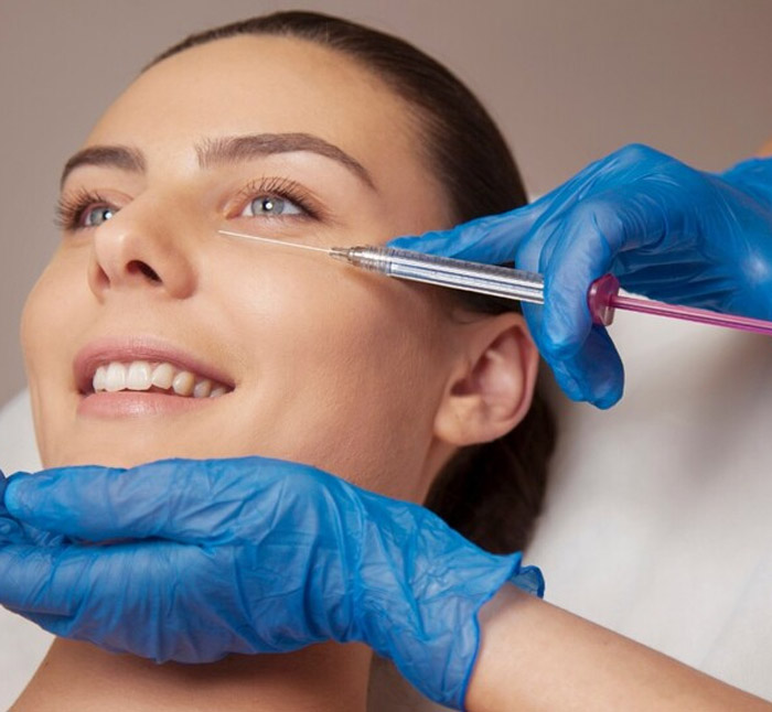 Close up view of young adult woman that have a visit in the dentist clinic. Conception of stomatology